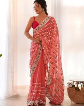 women embellished & embroidered saree