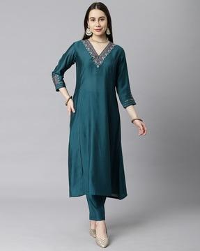 women embellished a-line kurta with insert pocket