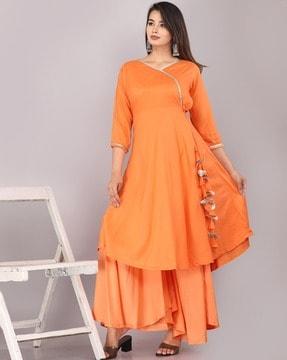 women embellished a-line kurta with sharara set