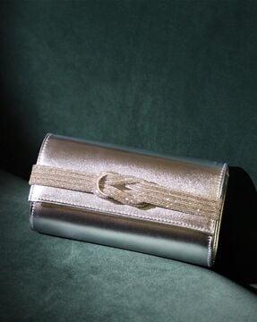 women embellished clutch with flap closure
