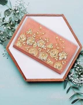 women embellished envelope clutch