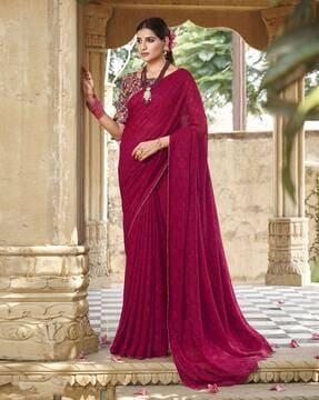 women embellished georgette saree with patch border