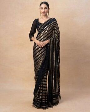 women embellished georgette saree with tassels