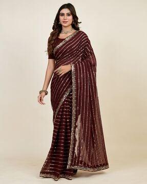 women embellished georgette saree