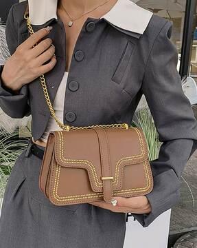 women embellished handbag with chain