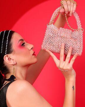 women embellished handbag