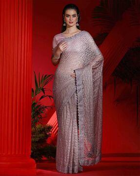 women embellished net saree with lace border