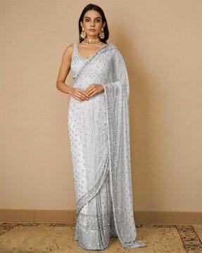 women embellished net saree