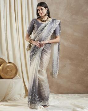women embellished net saree