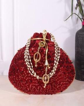 women embellished potli bag