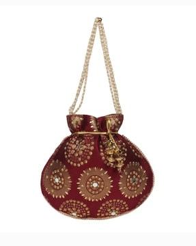 women embellished potli bag