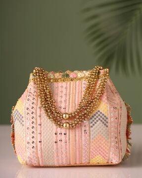 women embellished potli bag