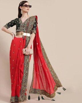 women embellished saree with blouse piece