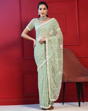 women embellished saree with blouse piece