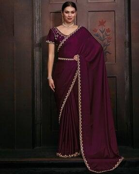 women embellished saree with contrast border