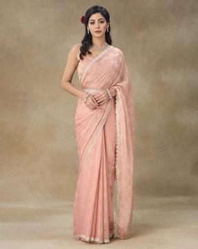 women embellished saree with contrast border