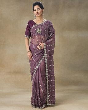 women embellished saree with contrast border