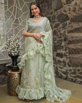 women embellished saree with ruffle border