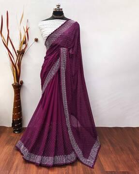 women embellished saree