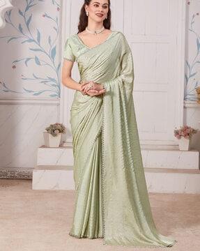 women embellished satin silk saree