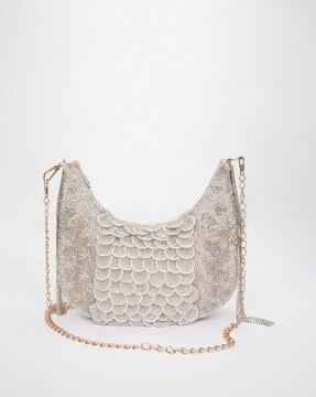women embellished sling bag