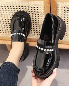 women embellished slip-on shoes