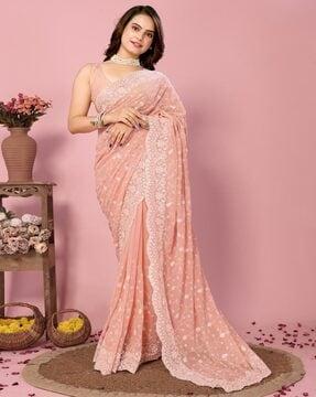 women embellished soft georgette saree