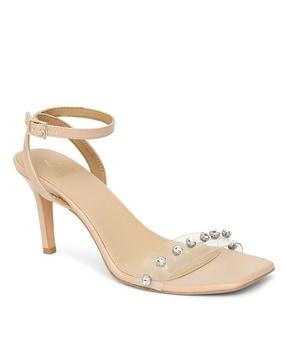 women embellished stilettos with buckle fastening