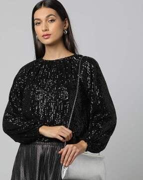 women embellished top with elasticated hem