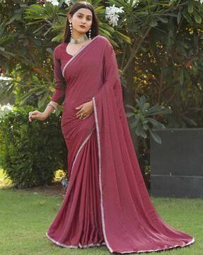 women embellished velvet saree