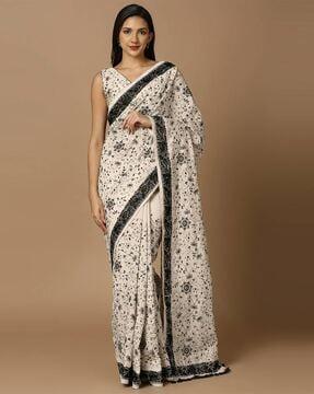 women embroidered & embellished saree