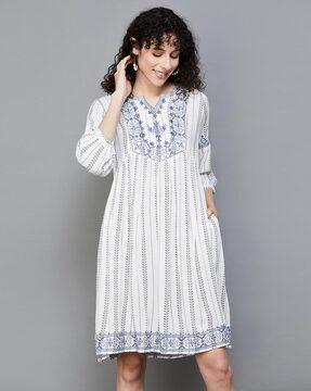 women embroidered a-line tunic with side pockets