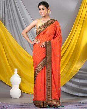 women embroidered chiffon saree with tassels