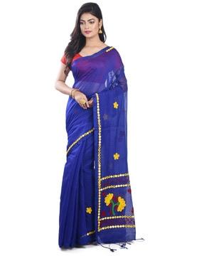 women embroidered cotton saree with tassels