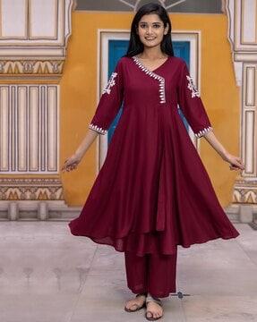 women embroidered flared kurta set