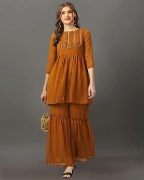 women embroidered flared kurta with sharara