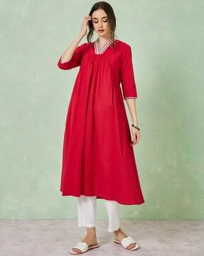 women embroidered flared kurta