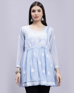 women embroidered flared kurti with slip
