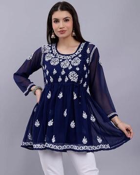 women embroidered flared tunic