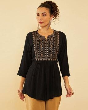 women embroidered flared tunic