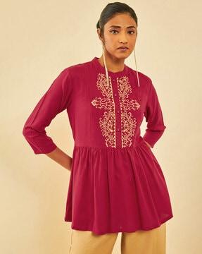 women embroidered flared tunic