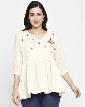 women embroidered flared tunic