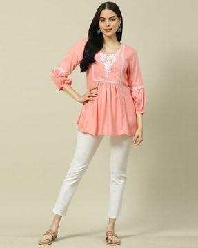 women embroidered flared tunic