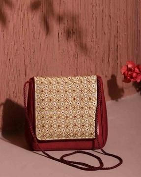 women embroidered foldover clutch