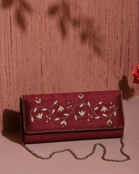 women embroidered foldover clutch