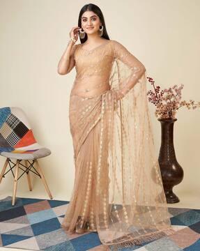 women embroidered net saree with tassels