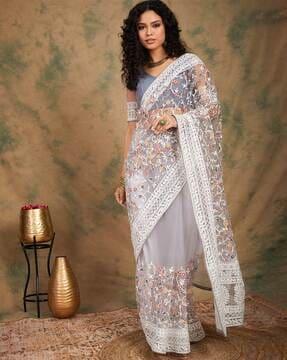 women embroidered net saree