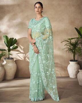 women embroidered net saree