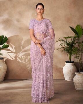 women embroidered net saree