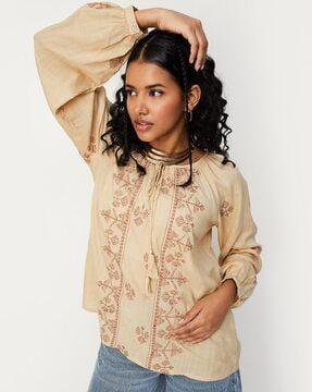 women embroidered regular fit blouse with round neck